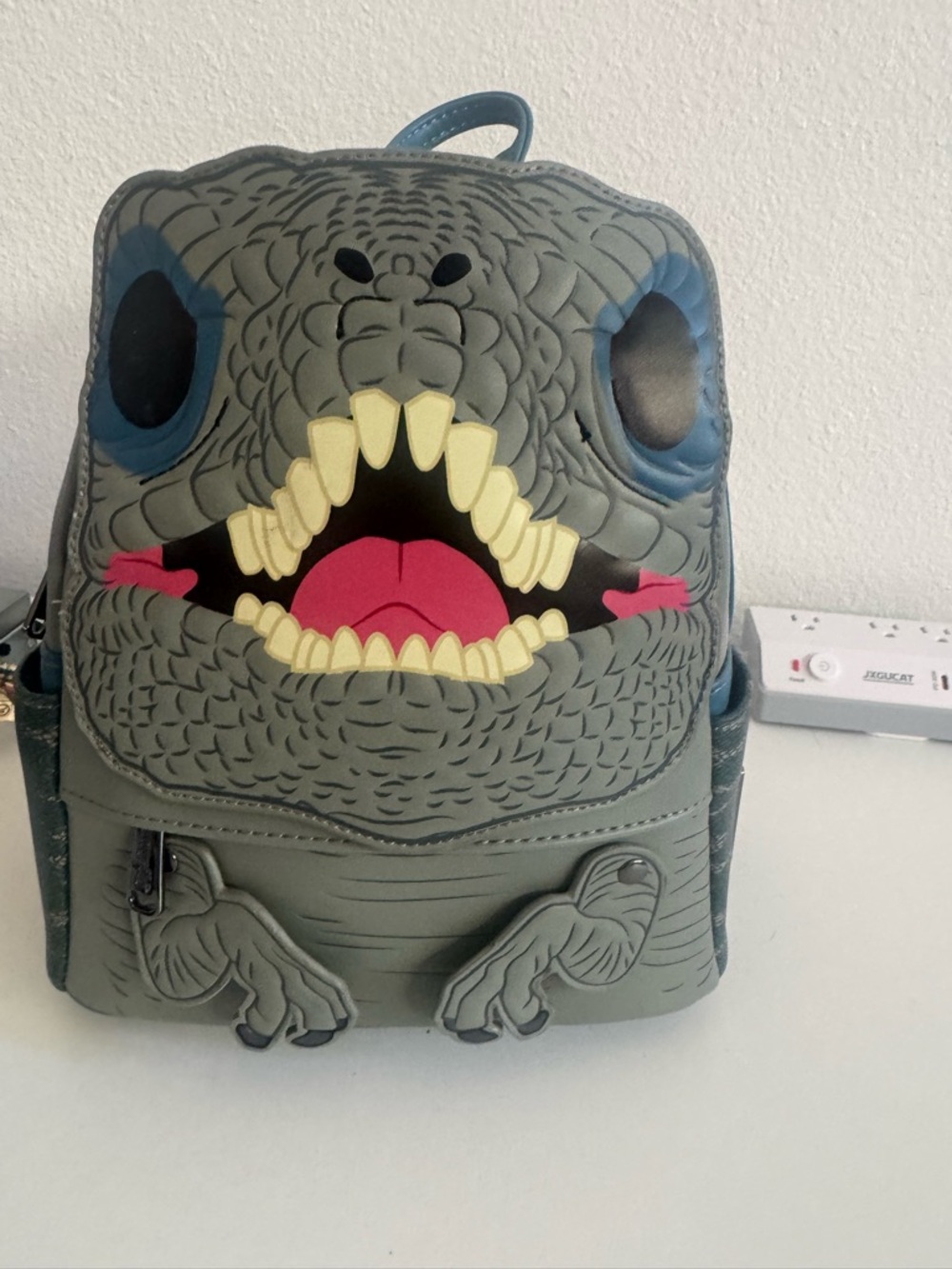 Loungefly Grey Monster Face Mini Backpack with Pink Tongue